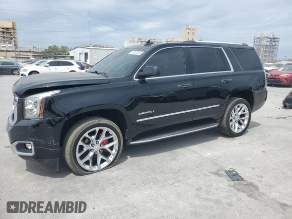 2017 GMC Yukon Denali with VIN 1GKS1CKJ9HR211240, listed as a Copart auction lot 50973015 with 95,484 mi miles and Salvage Title. Bid and sale history available at carsss.com. Image 1.