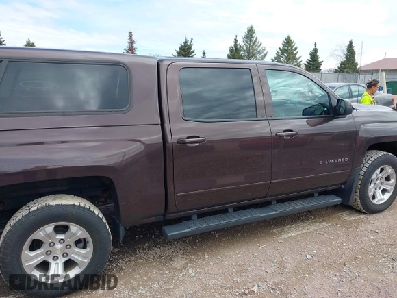 2016 Chevrolet Silverado 1500 LT with VIN 3GCUKREC3GG305792, listed as a IAAI auction lot 42083847 with 72,325 mi miles and . Bid and sale history available at DreamBid. Image 14.