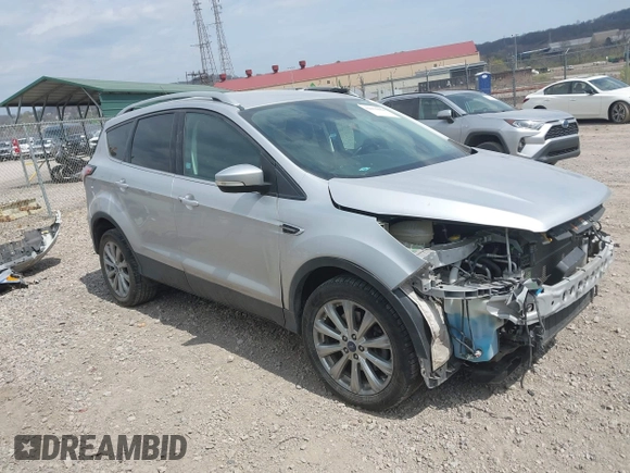 2017 Ford Escape Titanium with VIN 1FMCU9JD0HUE42509, listed as a IAAI auction lot 42079984 with 1 mi miles. Bid and sale history available at carsss.com. Image 1.