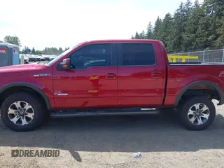 2014 Ford F-150 XL with VIN 1FTFW1ET5EKG06097, listed as a IAAI auction lot 42218332 with 208,263 mi miles and . Bid and sale history available at DreamBid. Image 14.