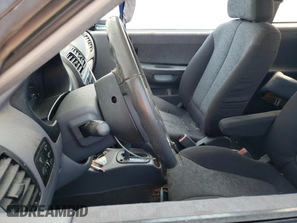 2005 Hyundai Accent GLS with VIN KMHCG35C75U354574, listed as a Copart auction lot 74931444 with 141,013 mi miles and Salvage Title. Bid and sale history available at carsss.com. Image 7.
