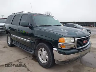 2003 GMC Yukon SLT with VIN 1GKEK13Z53J342417, listed as a IAAI auction lot 41502810 with 174,649 mi miles. Bid and sale history available at carsss.com. Image 1.