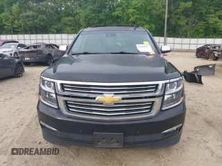 2015 Chevrolet Suburban LTZ with VIN 1GNSCKKCXFR731873, listed as a IAAI auction lot 42069917 with 108,963 mi miles and . Bid and sale history available at DreamBid. Image 13.
