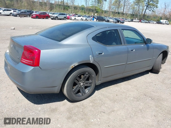 2006 Dodge Charger R/T with VIN 2B3KA53HX6H323577, listed as a IAAI auction lot 42128677 with 268,675 mi miles and . Bid and sale history available at carsss.com. Image 4.