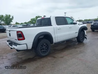 2020 Ram 1500 Big Horn with VIN 1C6SRFFT0LN105011, listed as a IAAI auction lot 42512812 with 71,825 mi miles and . Bid and sale history available at DreamBid. Image 4.