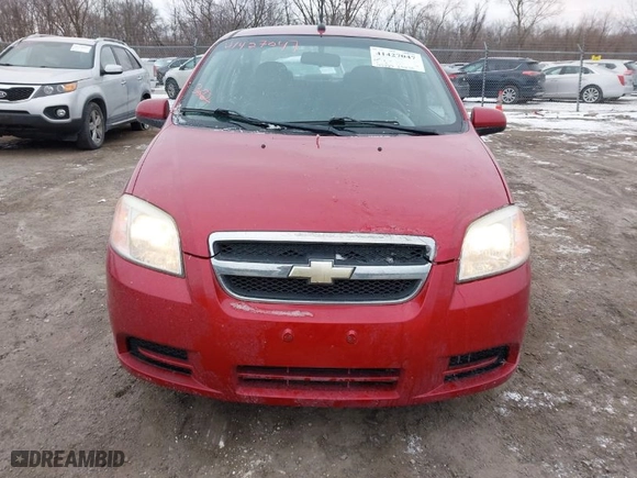 2011 Chevrolet Aveo LT w/1LT with VIN KL1TD5DE7BB195730, listed as a IAAI auction lot 41427047 with 123,773 mi miles. Bid and sale history available at carsss.com. Image 12.