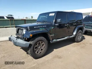 2015 Jeep Wrangler Unlimited Rubicon Hard Rock with VIN 1C4HJWFG3FL655221, listed as a Copart auction lot 60128585 with 110,604 mi miles and Salvage title. Bid and sale history available at DreamBid. Image 1.