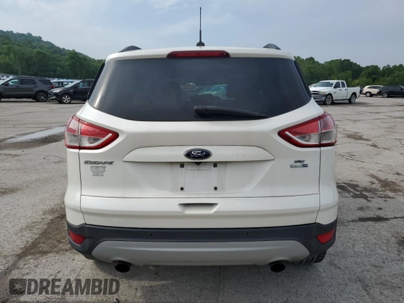 2016 Ford Escape SE z VIN 1FMCU9G97GUB45352, wystawiony jako Copart lot #60001055 z przebiegiem 93 685 mil mil oraz Szkoda całkowita • Salvage title. Historia ofert i sprzedaży dostępna na DreamBid. Obrazek 6.