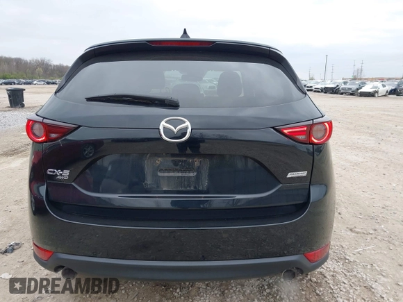 2018 Mazda CX-5 Grand Touring with VIN JM3KFBDM3J0384431, listed as a IAAI auction lot 42013474 with 65,018 mi miles. Bid and sale history available at carsss.com. Image 16.