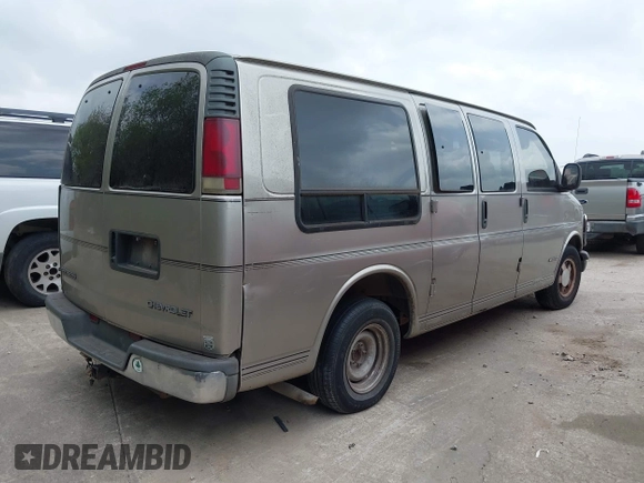 2000 Chevrolet Express Cargo Van w/YF7 with VIN 1GBFG15R6Y1176841, listed as a IAAI auction lot 41943022 with 428,908 mi miles. Bid and sale history available at carsss.com. Image 4.
