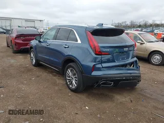 2024 Cadillac XT4 AWD Premium Luxury with VIN 1GYFZDR45RF143981, listed as a IAAI auction lot 42032787 with 14,700 mi miles and . Bid and sale history available at DreamBid. Image 3.