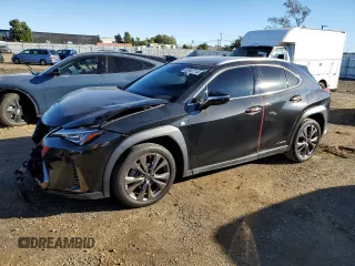 2021 Lexus UX with VIN JTHE9JBH0M2036963, listed as a Copart auction lot 82687744 with 24,857 mi miles and Salvage Title. Bid and sale history available at carsss.com. Image 1.