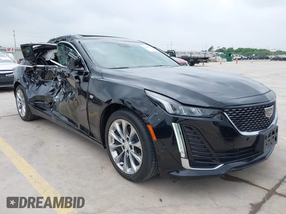 2023 Cadillac CT5 Premium Luxury z VIN 1G6DN5RK7P0119990, wystawiony jako IAAI lot #42293014 z przebiegiem 44 690 mil mil oraz . Historia ofert i sprzedaży dostępna na DreamBid. Obrazek 1.