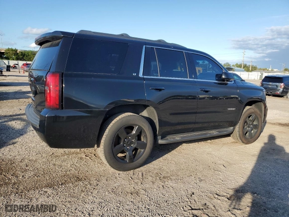 2019 Chevrolet Tahoe LT with VIN 1GNSCBKC0KR266577, listed as a Copart auction lot 79674694 with 75,002 mi miles and Salvage Title. Bid and sale history available at carsss.com. Image 3.