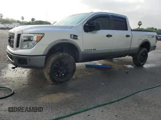 2016 Nissan Titan XD PRO-4X with VIN 1N6BA1F46GN508246, listed as a Copart auction lot 51699095 with 146,135 mi miles and Salvage Title. Bid and sale history available at carsss.com. Image 1.