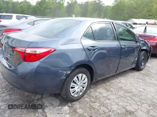 2019 Toyota Corolla L with VIN 5YFBURHE8KP936426, listed as a IAAI auction lot 42029018 with 190,163 mi miles and . Bid and sale history available at DreamBid. Image 4.