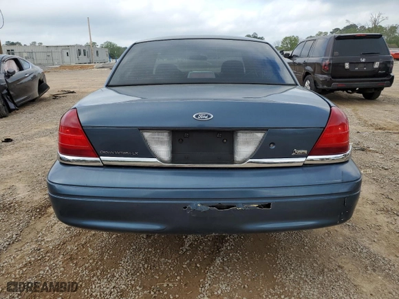 2009 Ford Crown Victoria LX with VIN 2FAHP74V79X124042, listed as a Copart auction lot 50974145 with 115,223 mi miles and Salvage Title. Bid and sale history available at carsss.com. Image 6.