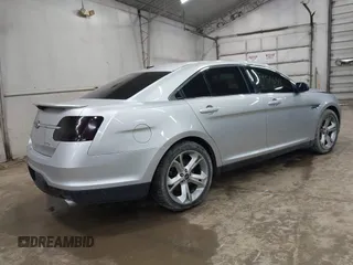 2012 Ford Taurus SHO с VIN 1FAHP2KTXCG107494, выставлен на аукционе IAAI как лот 41951659 с пробегом 128 015 миль миль и . История ставок и продаж доступна на DreamBid. Изображение 4.