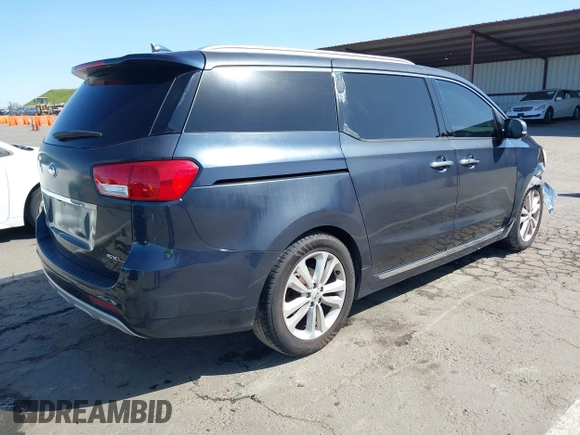 2016 Kia Sedona SX-L with VIN KNDME5C15G6083811, listed as a IAAI auction lot 41932863 with 124,218 mi miles. Bid and sale history available at carsss.com. Image 4.