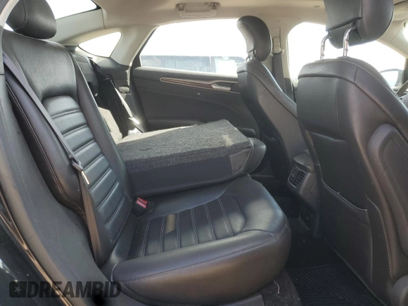 2013 Ford Fusion SE Hybrid с VIN 3FA6P0LU2DR181215, выставлен на аукционе Copart как лот 62474965 с пробегом 149 492 миль миль и Списание • Salvage title. История ставок и продаж доступна на DreamBid. Изображение 10.