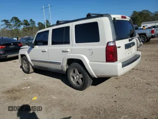 2010 Jeep Commander Sport with VIN 1J4RH4GK9AC113888, listed as a Copart auction lot 84553544 with 208,109 mi miles and Salvage title. Bid and sale history available at DreamBid. Image 2.