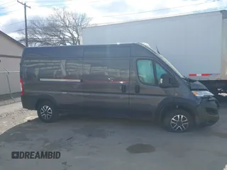 2023 Ram ProMaster Cargo with VIN 3C6LRVDG7PE547718, listed as a IAAI auction lot 41973977 with 34,178 mi miles. Bid and sale history available at carsss.com. Image 13.