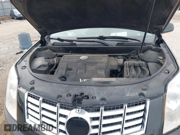 2015 Cadillac SRX Premium Collection with VIN 3GYFNGE37FS556860, listed as a IAAI auction lot 41854634 with 170,808 mi miles and . Bid and sale history available at DreamBid. Image 10.