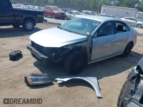2013 Volkswagen Jetta SE with VIN 3VWDX7AJ3DM404990, listed as a IAAI auction lot 42584934 with 164,126 mi miles and . Bid and sale history available at DreamBid. Image 2.