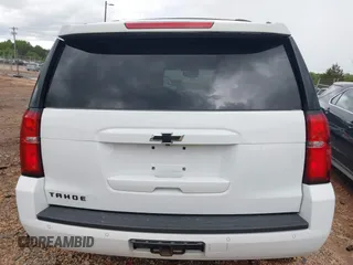 2018 Chevrolet Tahoe LT z VIN 1GNSKBKC9JR132670, wystawiony jako IAAI lot #42248273 z przebiegiem 136 636 mil mil oraz . Historia ofert i sprzedaży dostępna na DreamBid. Obrazek 16.