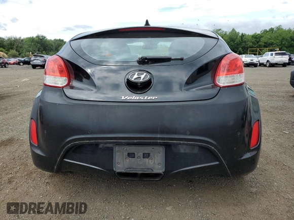 2013 Hyundai Veloster w/Gray Int z VIN KMHTC6AD9DU110094, wystawiony jako Copart lot #64660645 z przebiegiem 149 746 mil mil oraz Szkoda całkowita • Salvage title. Historia ofert i sprzedaży dostępna na DreamBid. Obrazek 6.