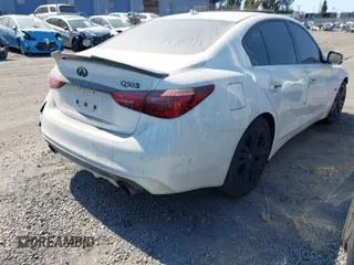 2020 Infiniti Q50 Luxe with VIN JN1EV7AP5LM201081, listed as a IAAI auction lot 42141354 with 75,353 mi miles and . Bid and sale history available at DreamBid. Image 4.