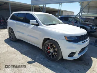 2017 Jeep Grand Cherokee SRT with VIN 1C4RJFDJ0HC699537, listed as a IAAI auction lot 41781500 with 105,640 mi miles. Bid and sale history available at carsss.com. Image 1.