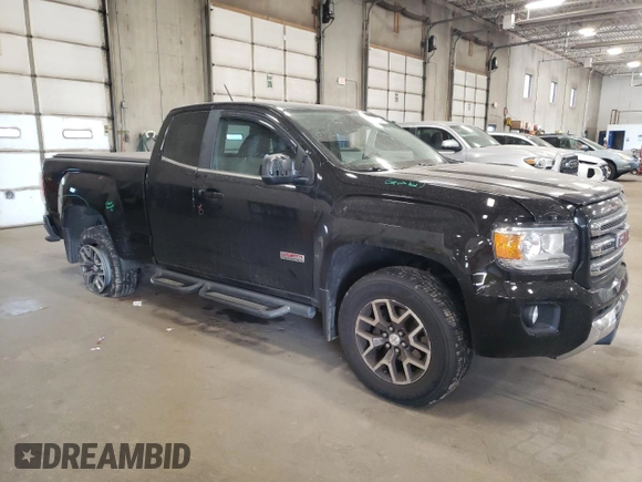 2015 GMC Canyon 4WD SLE with VIN 1GTH6BE32F1168788, listed as a Copart auction lot 76972934 with 158,562 mi miles and Salvage Title. Bid and sale history available at carsss.com. Image 4.