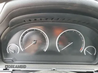 2015 BMW 7 Series 740Li with VIN WBAYE4C50FD947217, listed as a Copart auction lot 87899785 with Not provided miles and Salvage title. Bid and sale history available at DreamBid. Image 9.