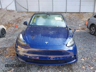 2024 Tesla Model Y Long Range with VIN 7SAYGDEE1RA266328, listed as a IAAI auction lot 40610351 with 13,573 mi miles. Bid and sale history available at carsss.com. Image 13.