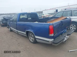 1997 GMC New Sierra 1500 SLE with VIN 1GTEC14W6VZ503469, listed as a IAAI auction lot 41798168 with 232,567 mi miles. Bid and sale history available at carsss.com. Image 3.