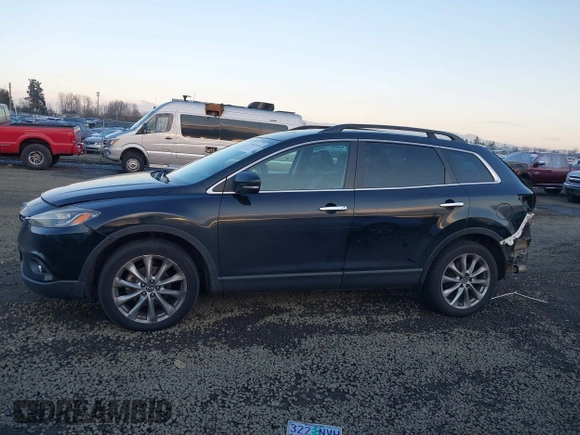 2014 Mazda CX-9 Grand Touring with VIN JM3TB3DV7E0429276, listed as a IAAI auction lot 41415446 with 94,939 mi miles and . Bid and sale history available at DreamBid. Image 15.