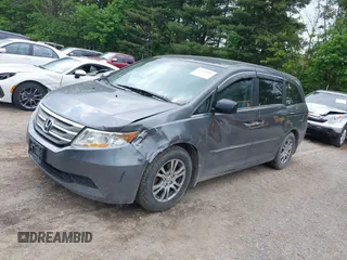 2012 Honda Odyssey EX z VIN 5FNRL5H45CB084342, wystawiony jako IAAI lot #42329303 z przebiegiem 173 711 mil mil oraz . Historia ofert i sprzedaży dostępna na DreamBid. Obrazek 2.