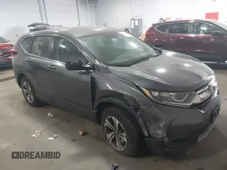 2018 Honda CR-V LX z VIN 5J6RW6H33JL003461, wystawiony jako IAAI lot #42279165 z przebiegiem 67 878 mil mil oraz . Historia ofert i sprzedaży dostępna na DreamBid. Obrazek 1.