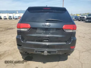 2014 Jeep Grand Cherokee Laredo with VIN 1C4RJFAG4EC486790, listed as a Copart auction lot 55314735 with 143,096 mi miles and Salvage Title. Bid and sale history available at DreamBid. Image 6.