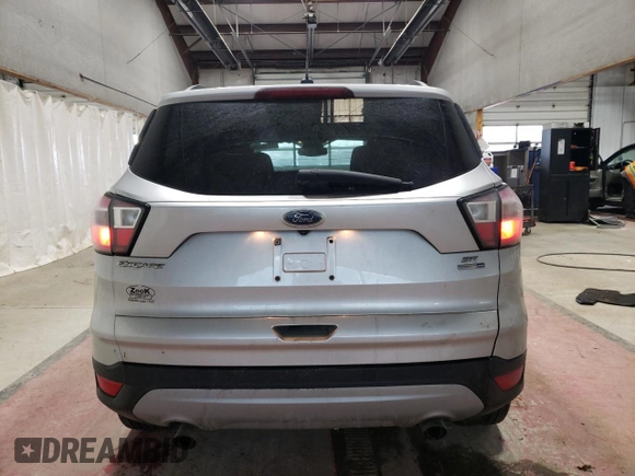 2018 Ford Escape SE with VIN 1FMCU9GD7JUA25403, listed as a Copart auction lot 87158814 with 121,281 mi miles and Salvage Title. Bid and sale history available at carsss.com. Image 6.