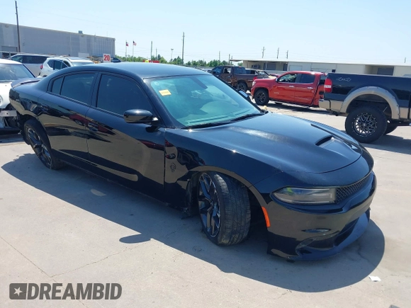 2021 Dodge Charger R/T with VIN 2C3CDXCT4MH684900, listed as a IAAI auction lot 41992358 with 71,386 mi miles and . Bid and sale history available at DreamBid. Image 1.