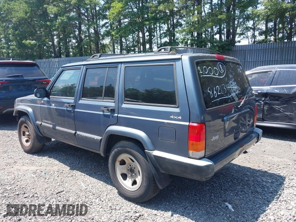2001 Jeep Cherokee Sport z VIN 1J4FF48S71L572604, wystawiony jako IAAI lot #42817599 z przebiegiem 212 774 mil mil oraz . Historia ofert i sprzedaży dostępna na DreamBid. Obrazek 3.
