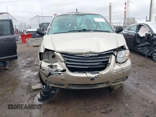 2007 Chrysler Town & Country Limited with VIN 2A8GP64L87R314831, listed as a IAAI auction lot 41729945 with 64,813 mi miles and . Bid and sale history available at DreamBid. Image 12.