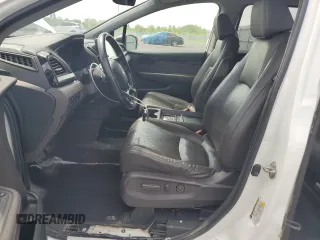 2019 Honda Odyssey Touring z VIN 5FNRL6H80KB501681, wystawiony jako Copart lot #58814945 z przebiegiem 105 287 mil mil oraz Szkoda całkowita • Salvage title. Historia ofert i sprzedaży dostępna na DreamBid. Obrazek 7.