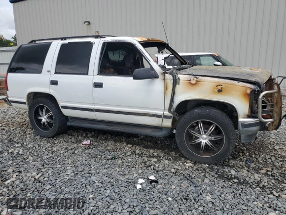 1999 GMC Yukon with VIN 1GKEK13R8XJ723636, listed as a Copart auction lot 64458594 with 0 mi miles and Non Repairable. Bid and sale history available at carsss.com. Image 4.