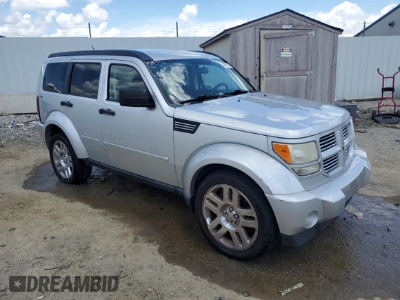 2011 Dodge Nitro Heat with VIN 1D4PU4GK0BW604975, listed as a Copart auction lot 56979275 with 160,494 mi miles and Salvage title. Bid and sale history available at DreamBid. Image 4.