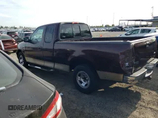 2000 Ford F-150 with VIN 1FTRX17W5YKA50203, listed as a Copart auction lot 54734615 with Not Provided miles and Salvage Title. Bid and sale history available at DreamBid. Image 2.