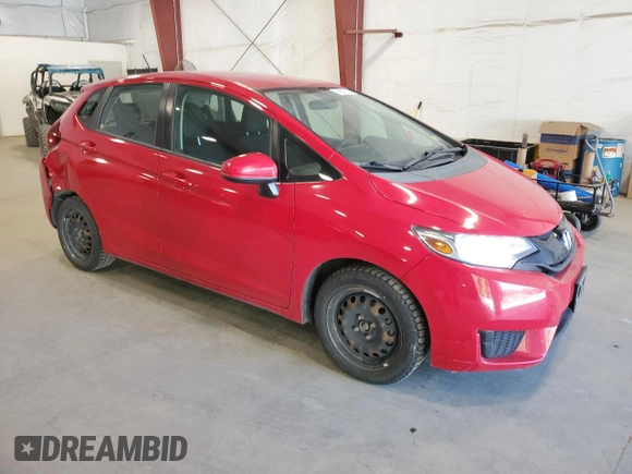 2015 Honda Fit LX with VIN 3HGGK5G55FM780043, listed as a Copart auction lot 69003154 with 141,424 mi miles and Salvage Title. Bid and sale history available at carsss.com. Image 4.