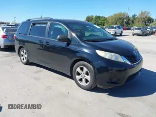 2016 Toyota Sienna LE AAS with VIN 5TDKK3DC1GS697730, listed as a IAAI auction lot 41727769 with 135,469 mi miles. Bid and sale history available at carsss.com. Image 1.